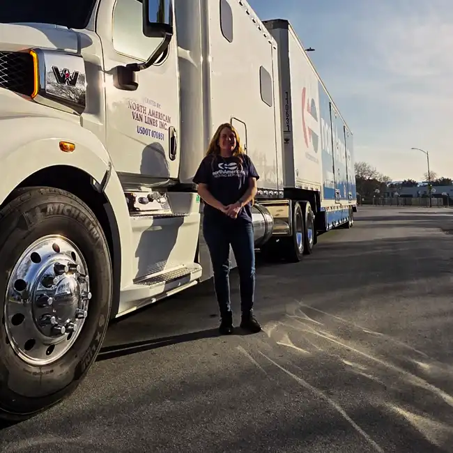 Humboldt Moving & Storage team member standing beside a North American Van Lines moving truck
